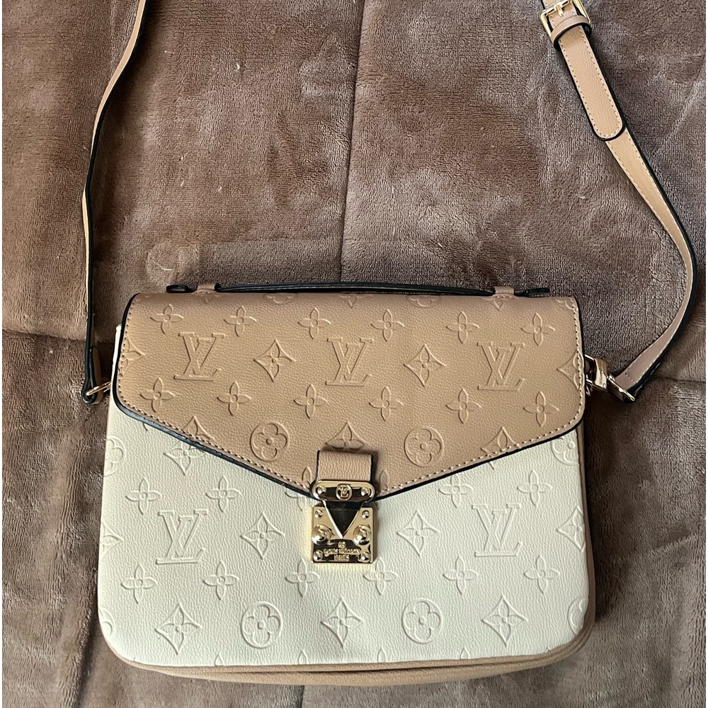 Faux Louis Vuitton purse.